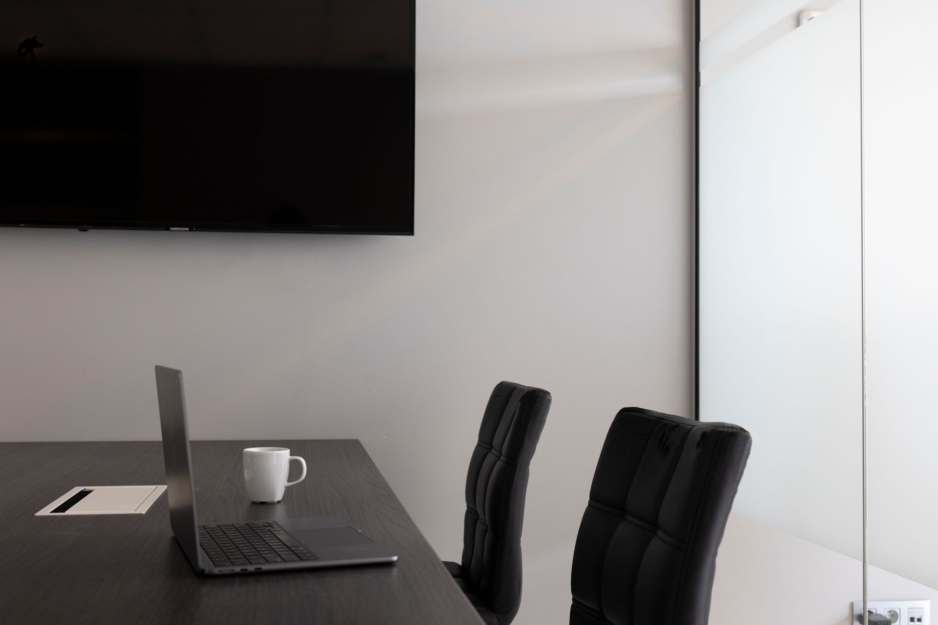 Corporate boardroom with clean lines and focus environment